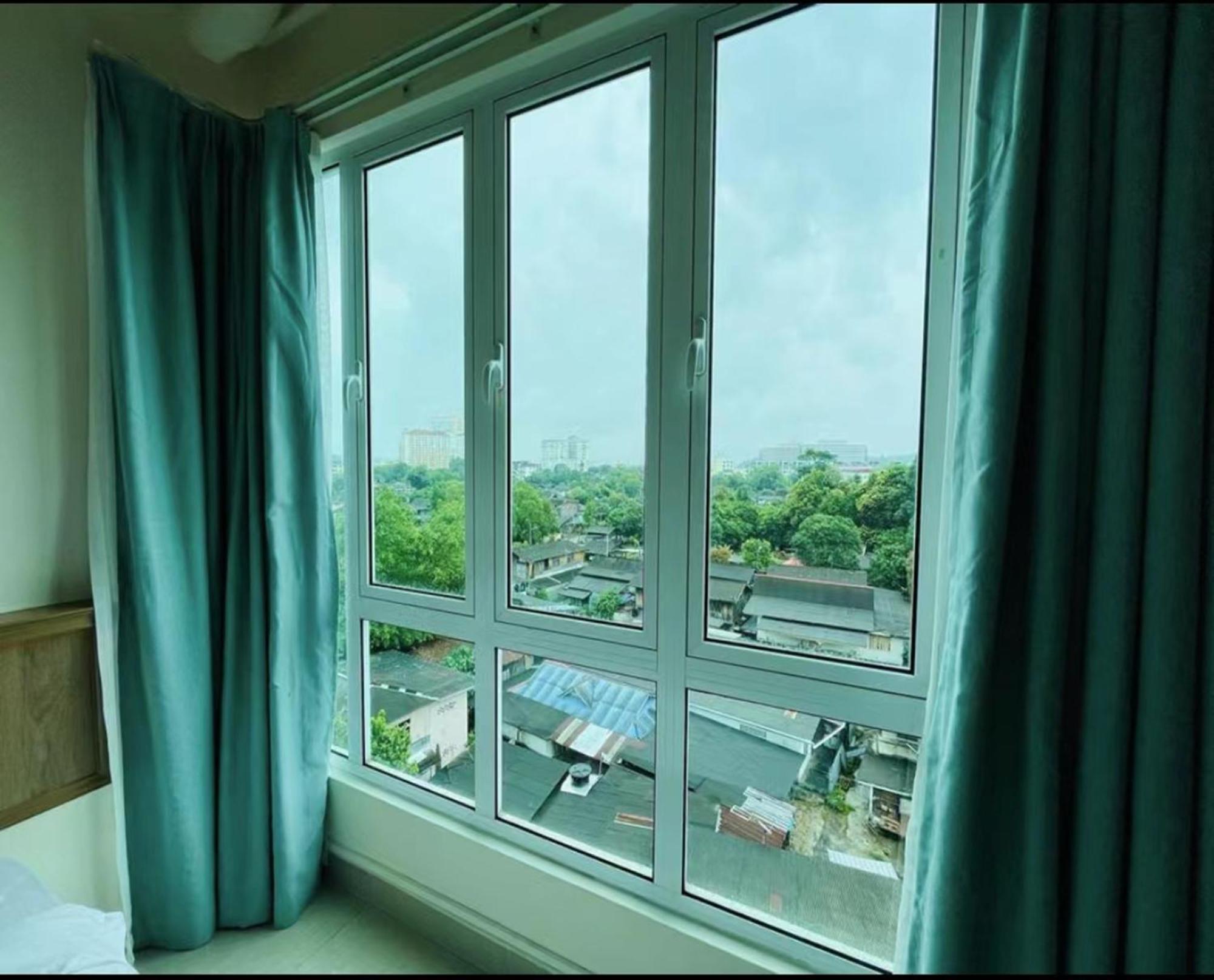 كُوالا تيرينغانو Alexis Kt Roomstay الغرفة الصورة