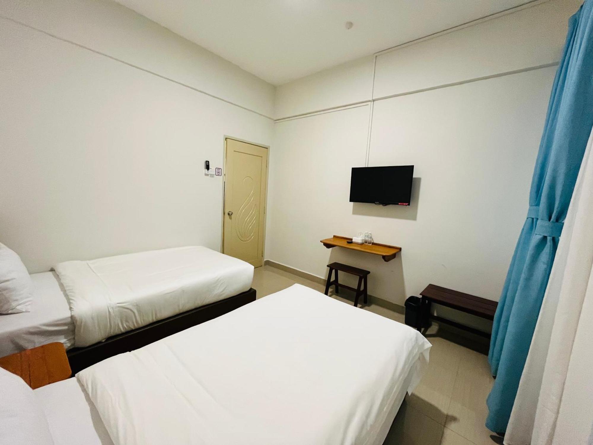 كُوالا تيرينغانو Alexis Kt Roomstay الغرفة الصورة