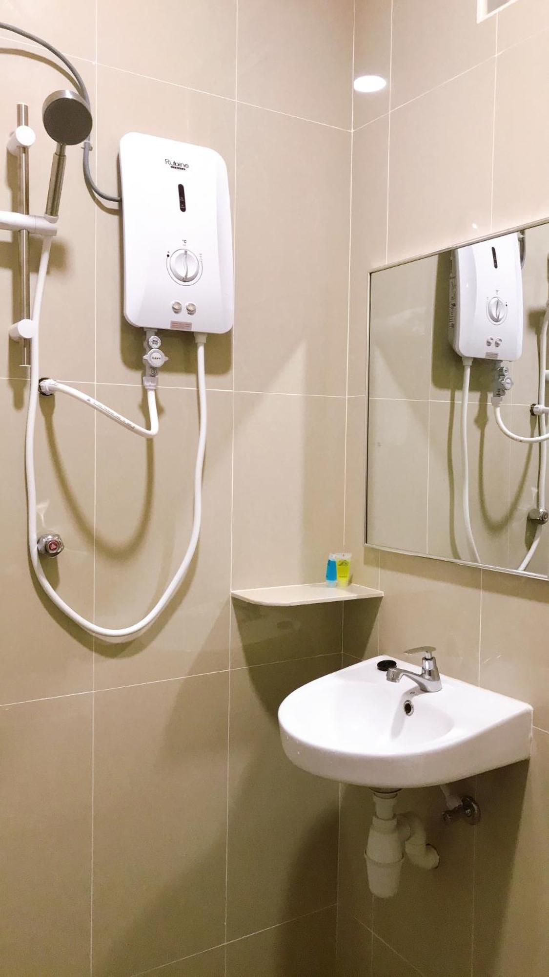 كُوالا تيرينغانو Alexis Kt Roomstay الغرفة الصورة