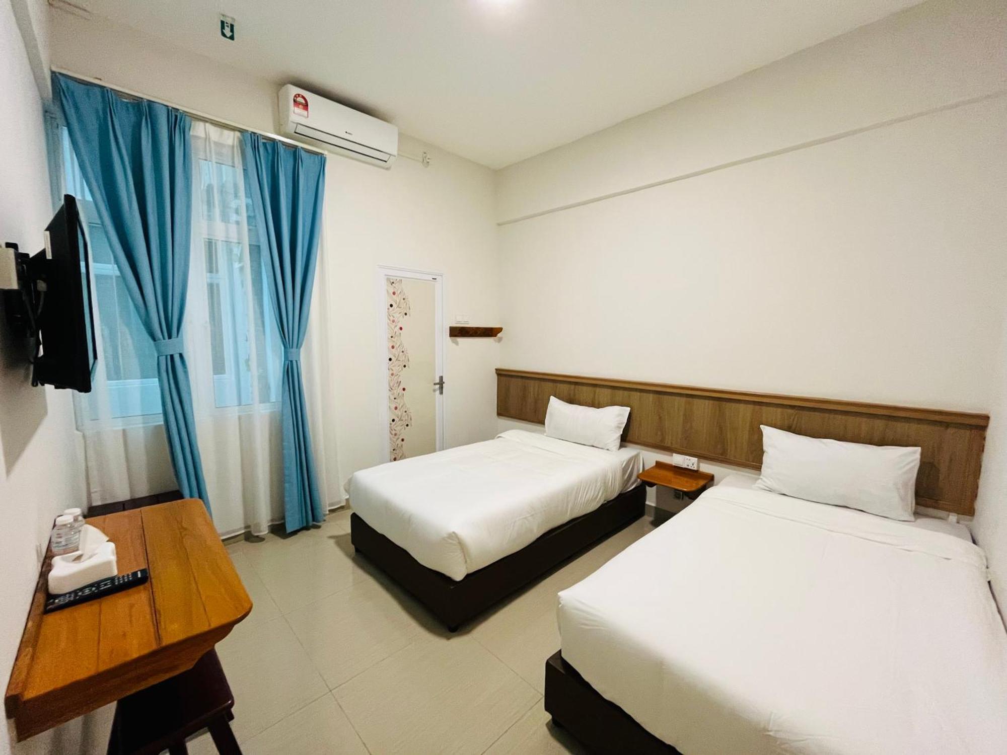 كُوالا تيرينغانو Alexis Kt Roomstay الغرفة الصورة
