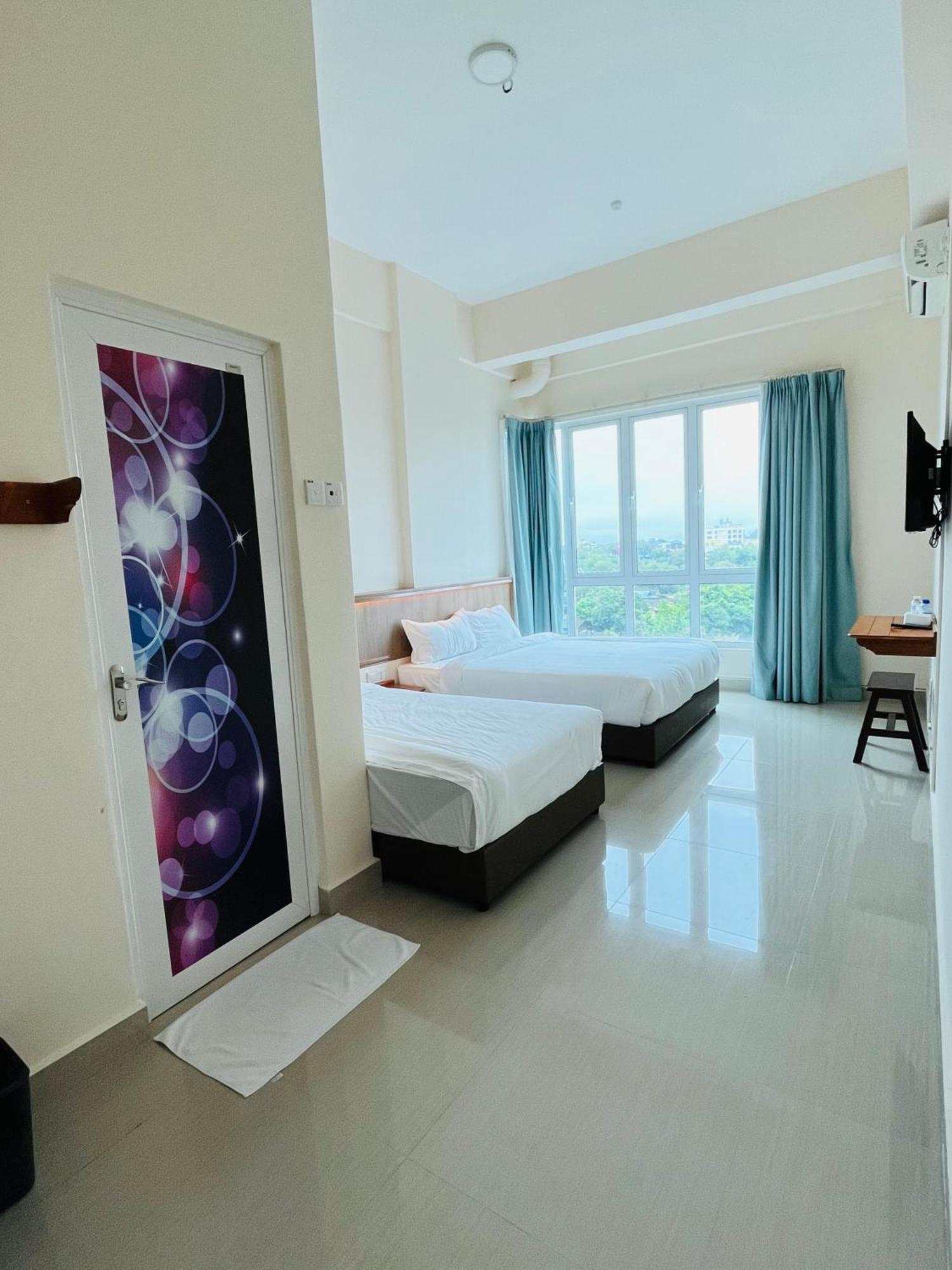 كُوالا تيرينغانو Alexis Kt Roomstay الغرفة الصورة